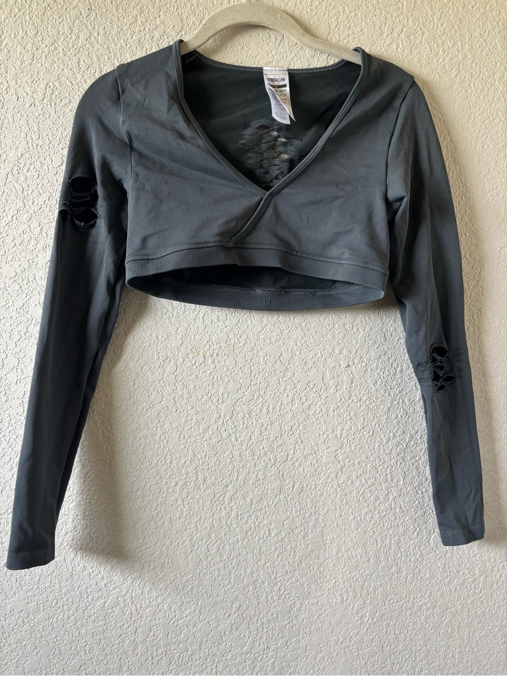 Gymshark Charcoal Gray Cropped V-Neck Distressed Long Sleeve Top